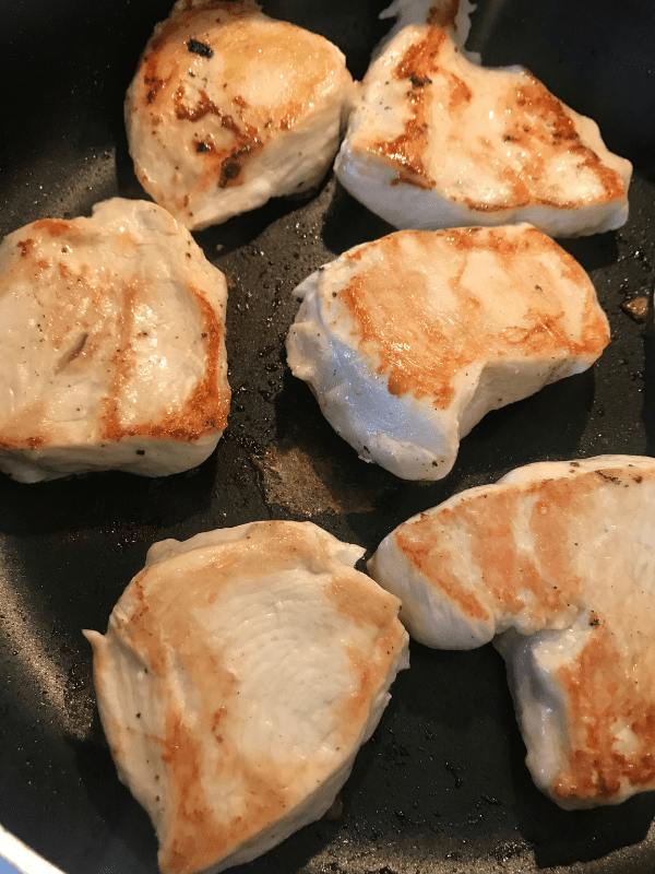 Cook chicken for French Onion Chicken Sandwiches
