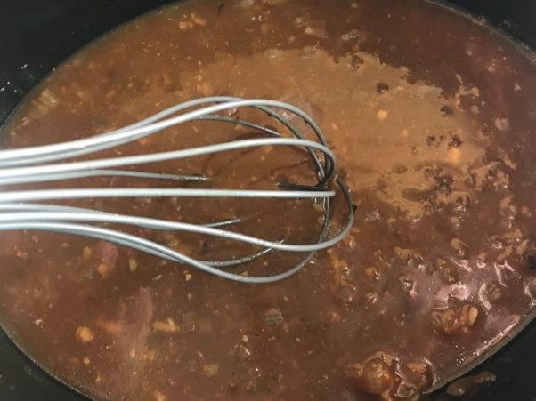 Thicken the sauce in the slow cooker before topping the pork chops.