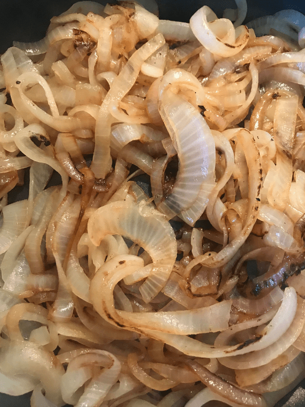 Cooking onions for French Onion Chicken Sandwiches