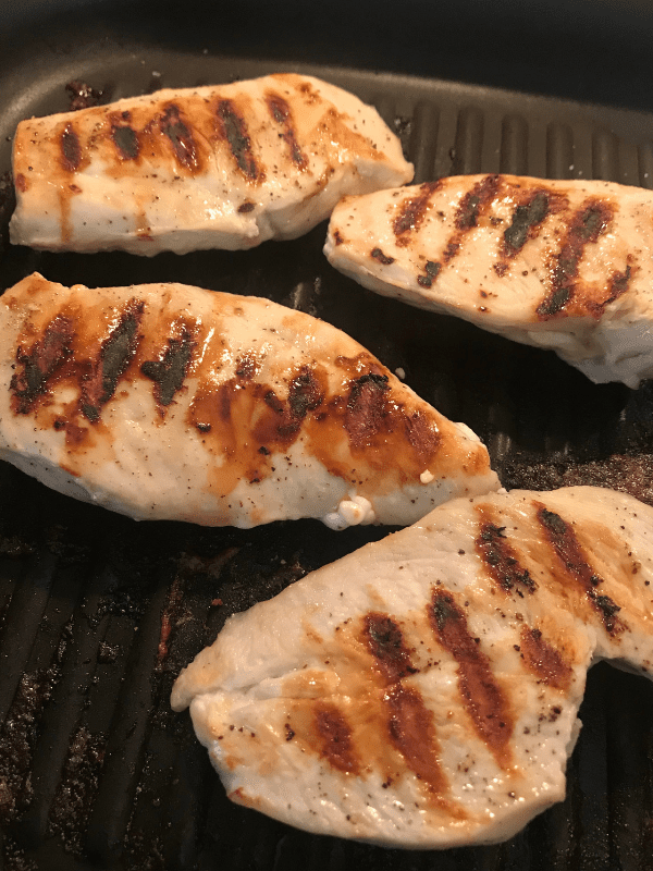 Grill chicken in a grill pan.