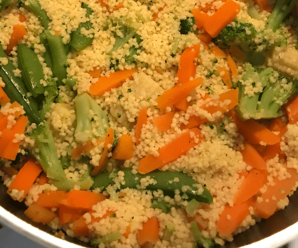 Cook the couscous in chicken broth and Asian vegetable medley.